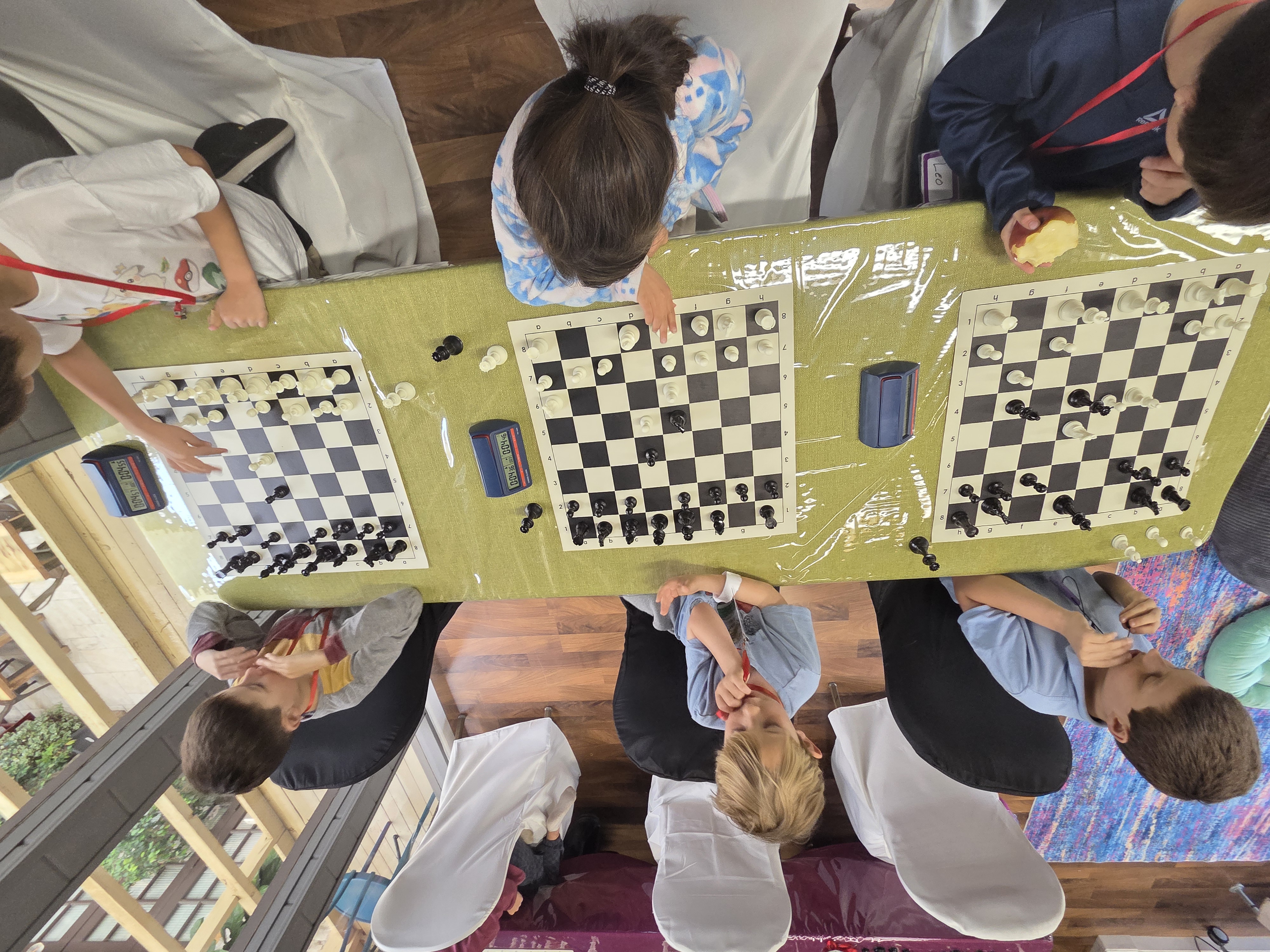 Kids playing chess in after-school program at Carmel Valley Chess Club