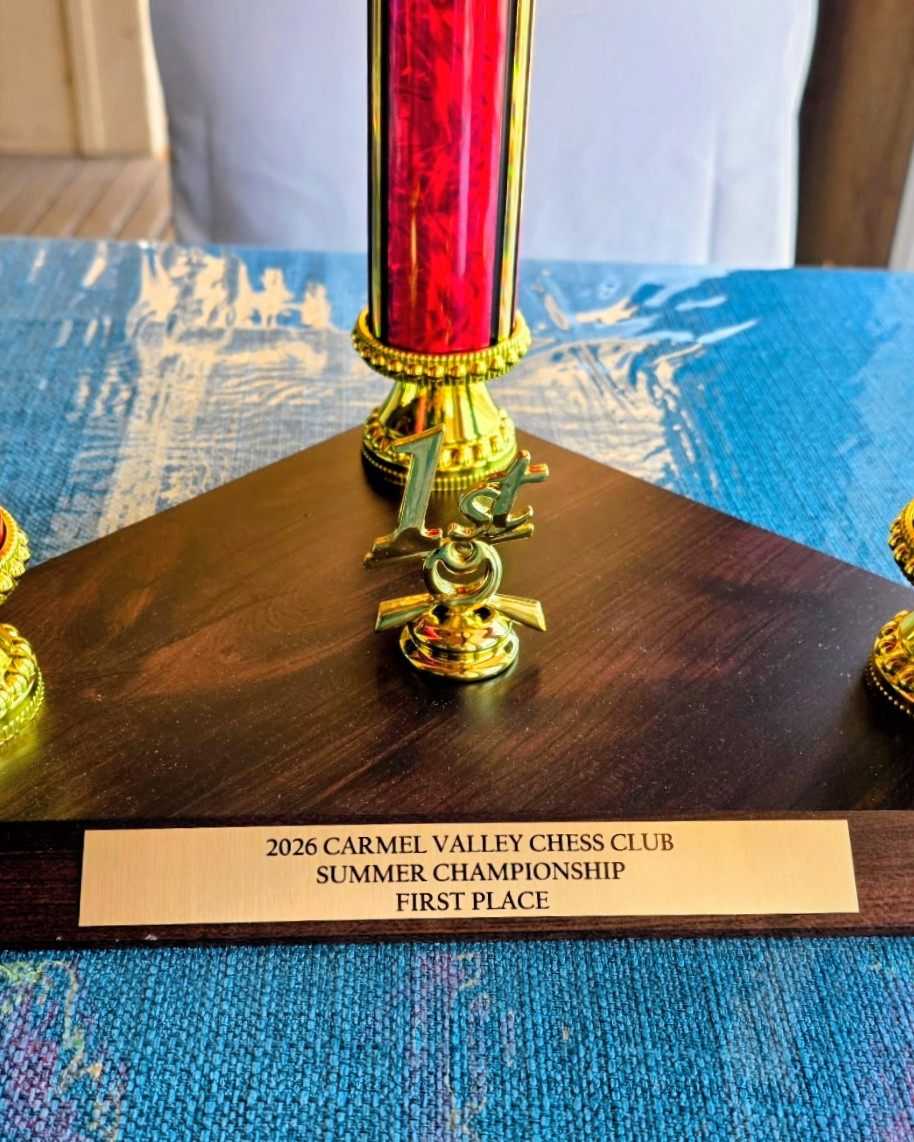 Close-up of the 2026 CV Chess Club Summer Championship First Place brass plate